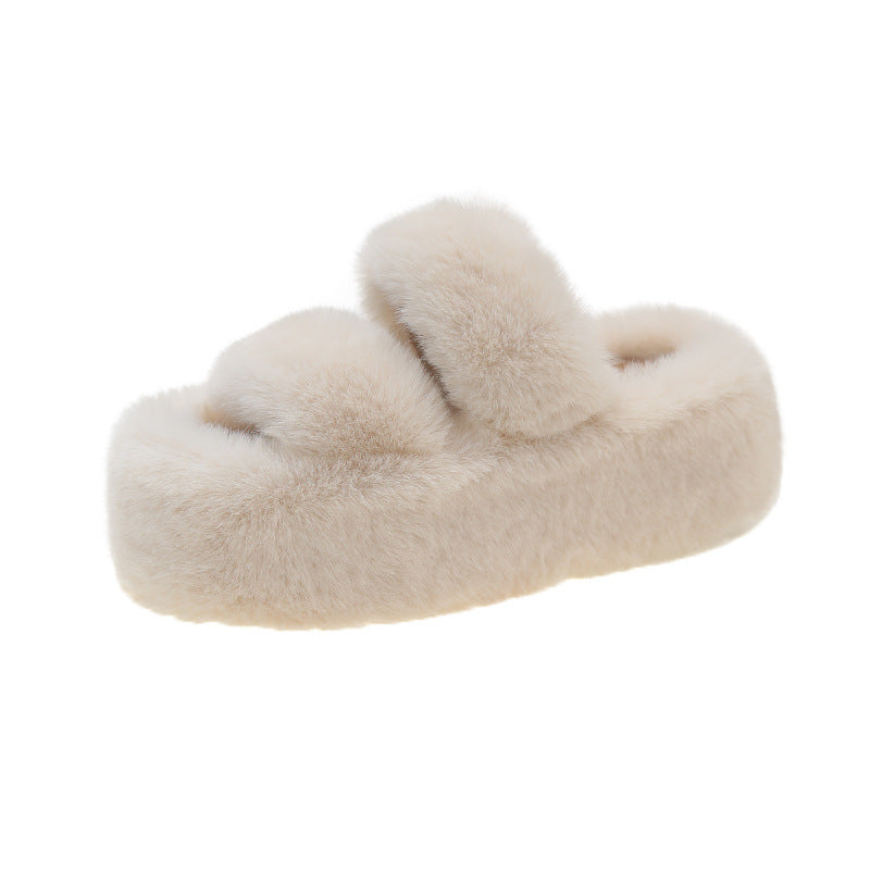 Thick-soled fuzzy slipper.