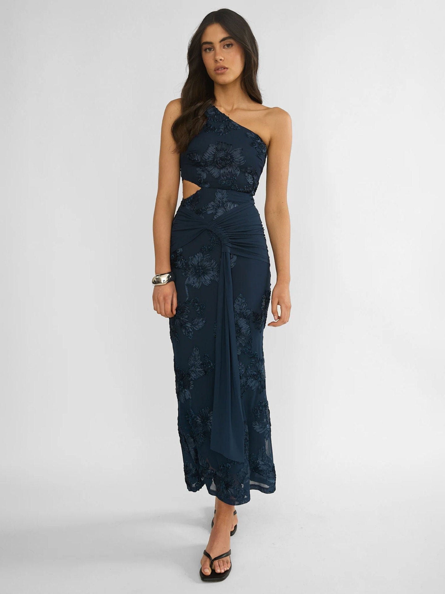 single-shoulder flower-embroidered dress with a pleated waistline