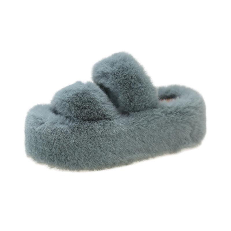 Thick-soled fuzzy slipper.
