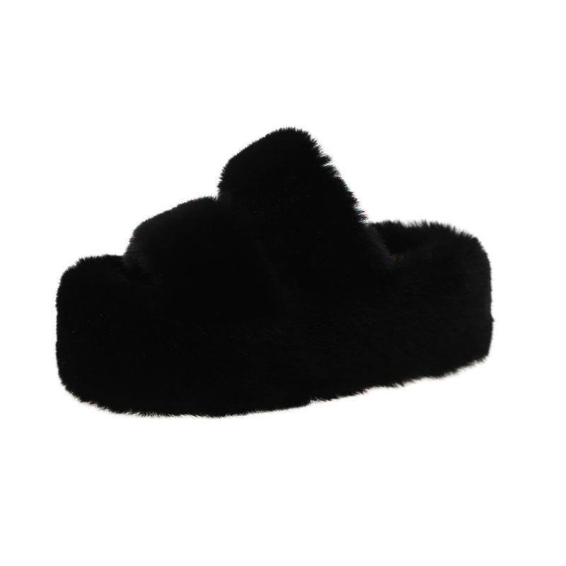 Thick-soled fuzzy slipper.