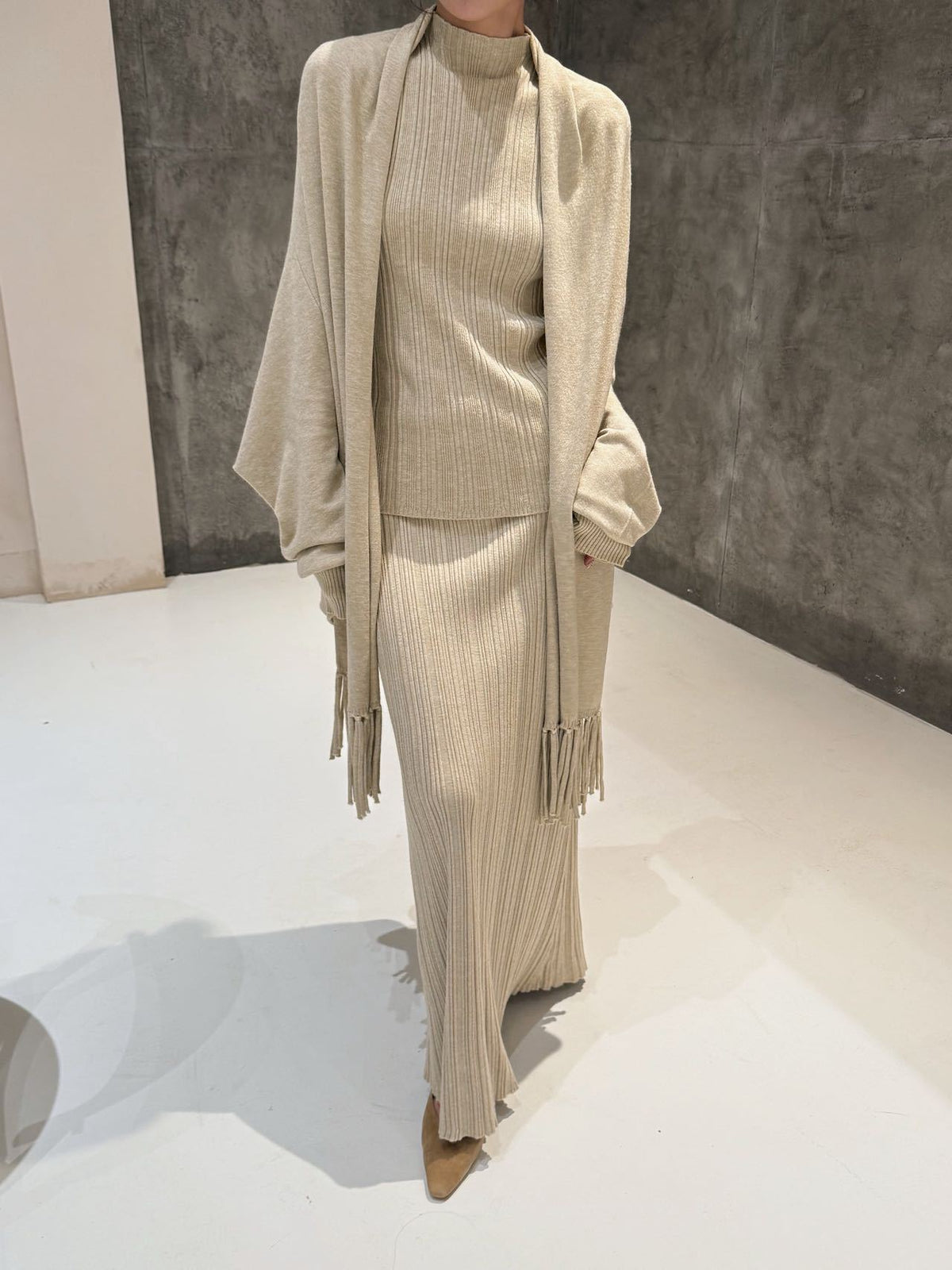 Knitted three-piece set, knitted shawl, vest and skirt