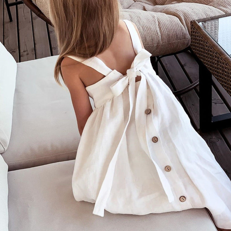 Girls' cotton and linen dress with button and bow back details
