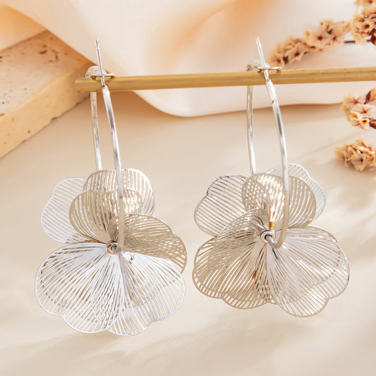 Exaggerated floral, ginkgo leaf and flower earrings