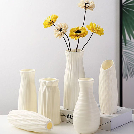white abstract vases