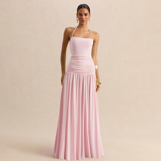 cinching waist and a slimming pleated gown