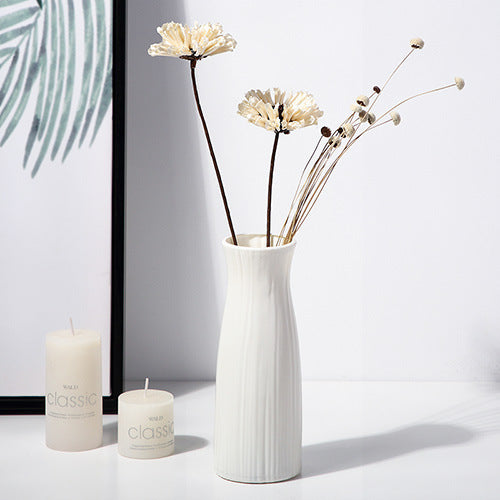 white abstract vases