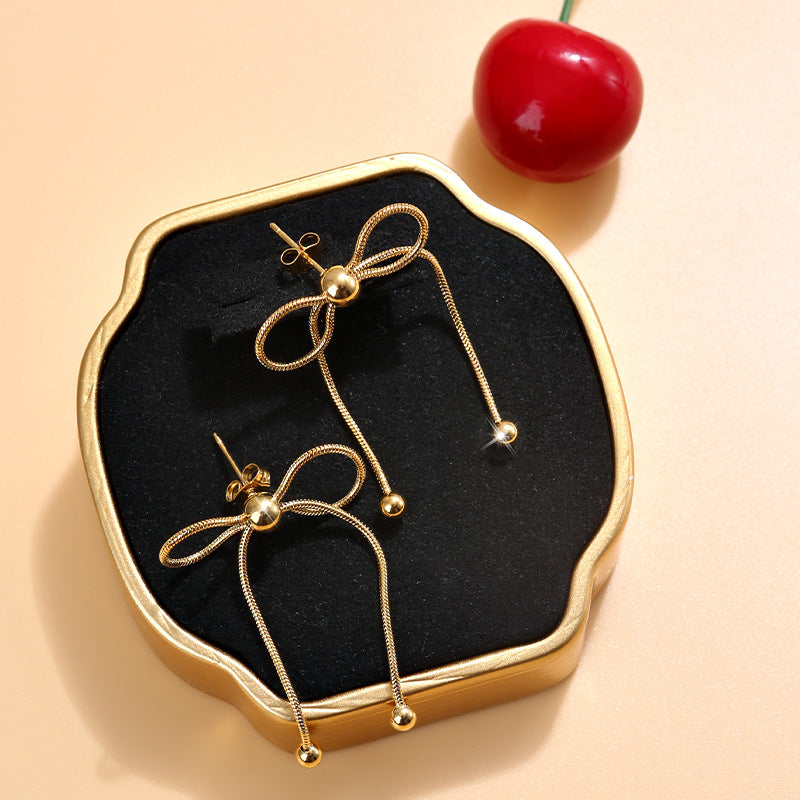 loose bow earrings