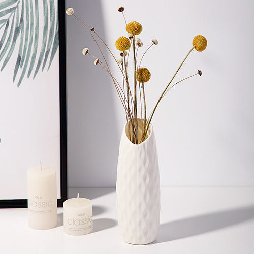 white abstract vases