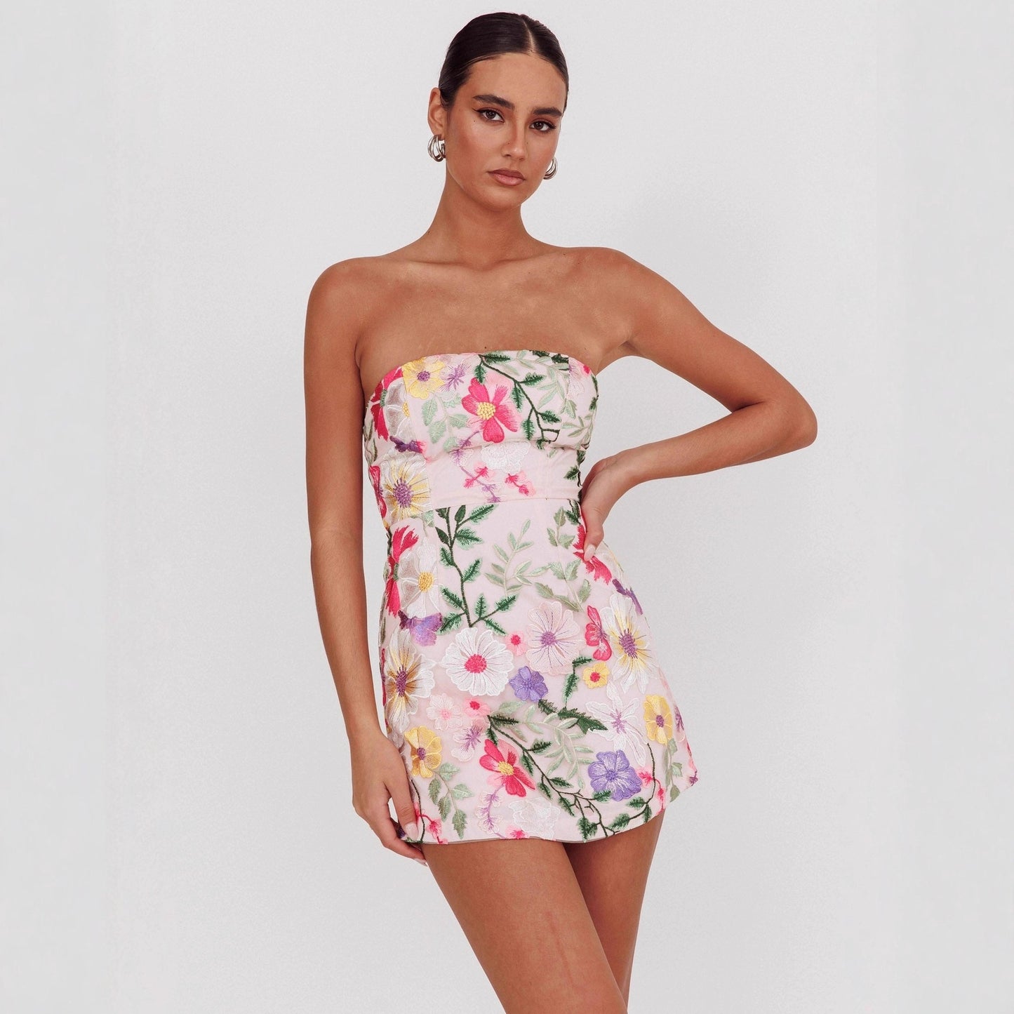figure-hugging strapless short floral dress