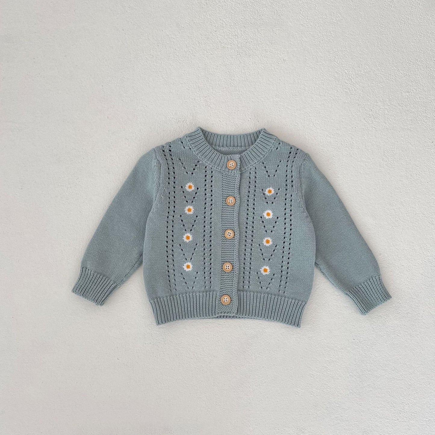 Daisy embroidered knitted coat and a knitted halter dress separates