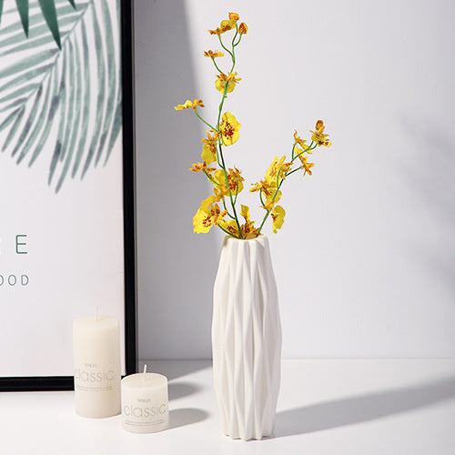 white abstract vases