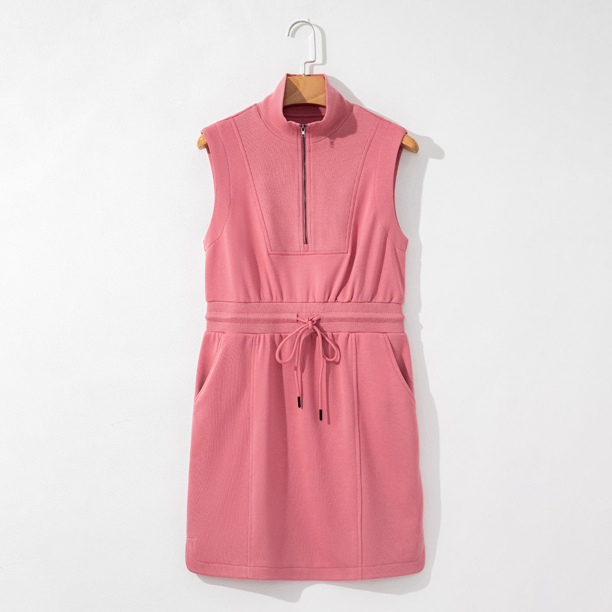 women's sleeveless dress with drawstring waist, pockets and quarter zip neckline