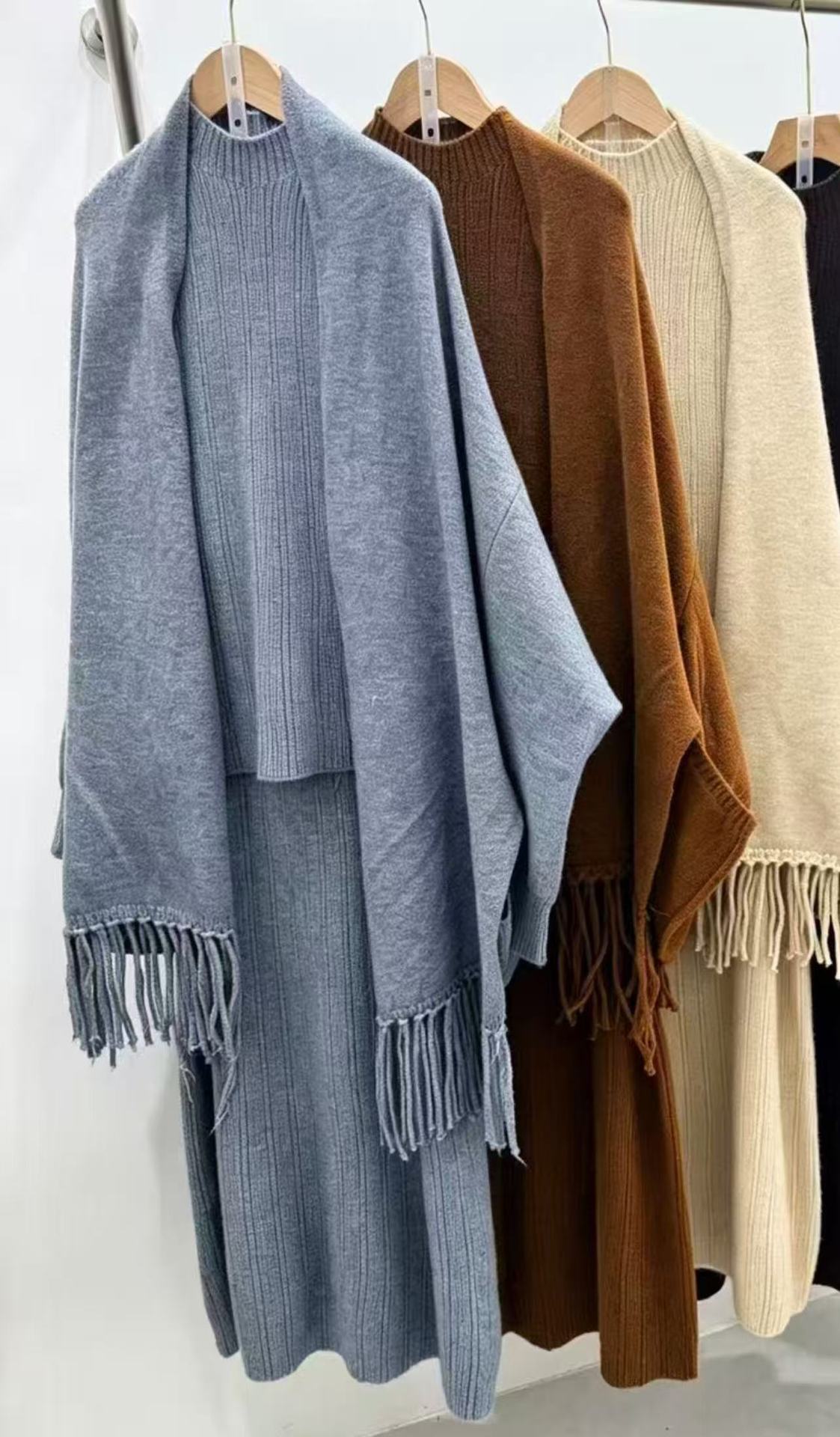 Knitted three-piece set, knitted shawl, vest and skirt