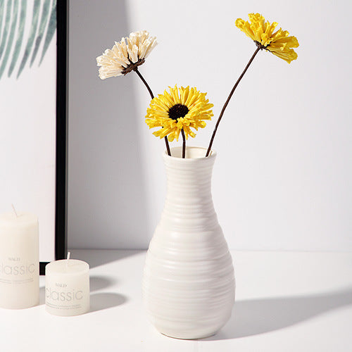 white abstract vases