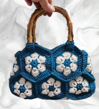 hand-woven bag with bamboo handle