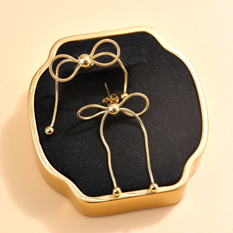 loose bow earrings