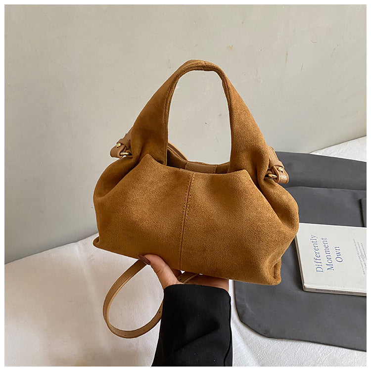 hand-held cloud-shaped dumpling bag