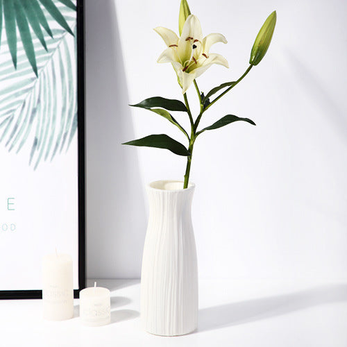 white abstract vases