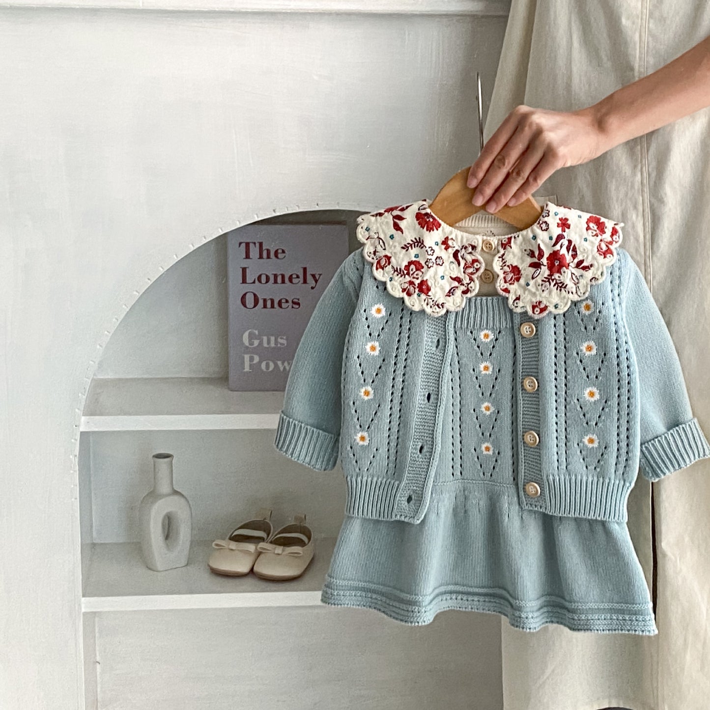 Daisy embroidered knitted coat and a knitted halter dress separates
