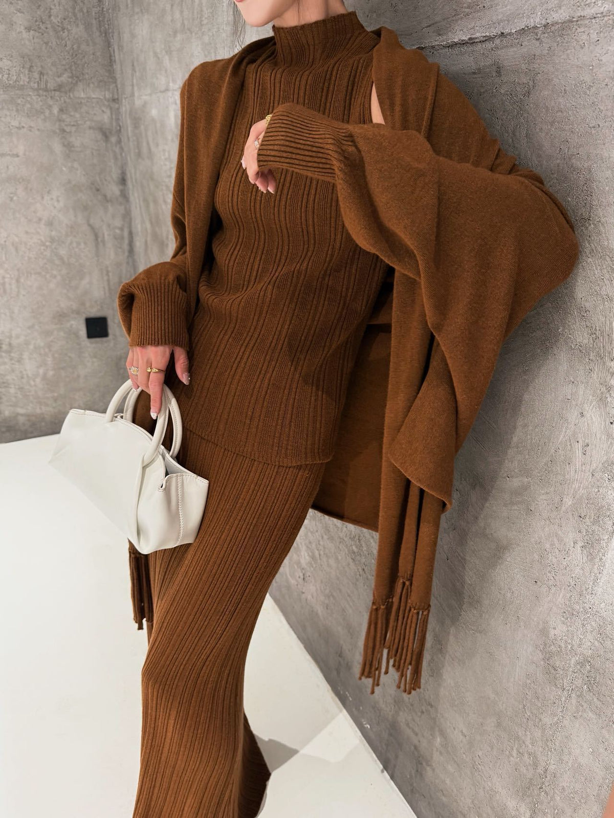 Knitted three-piece set, knitted shawl, vest and skirt